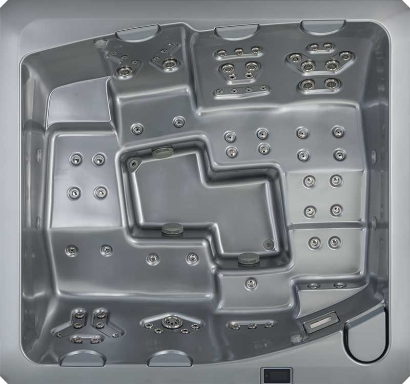 Vedere de sus a unei piscine spa USSPA gri, cu scaune ergonomice și zone cu jeturi multiple